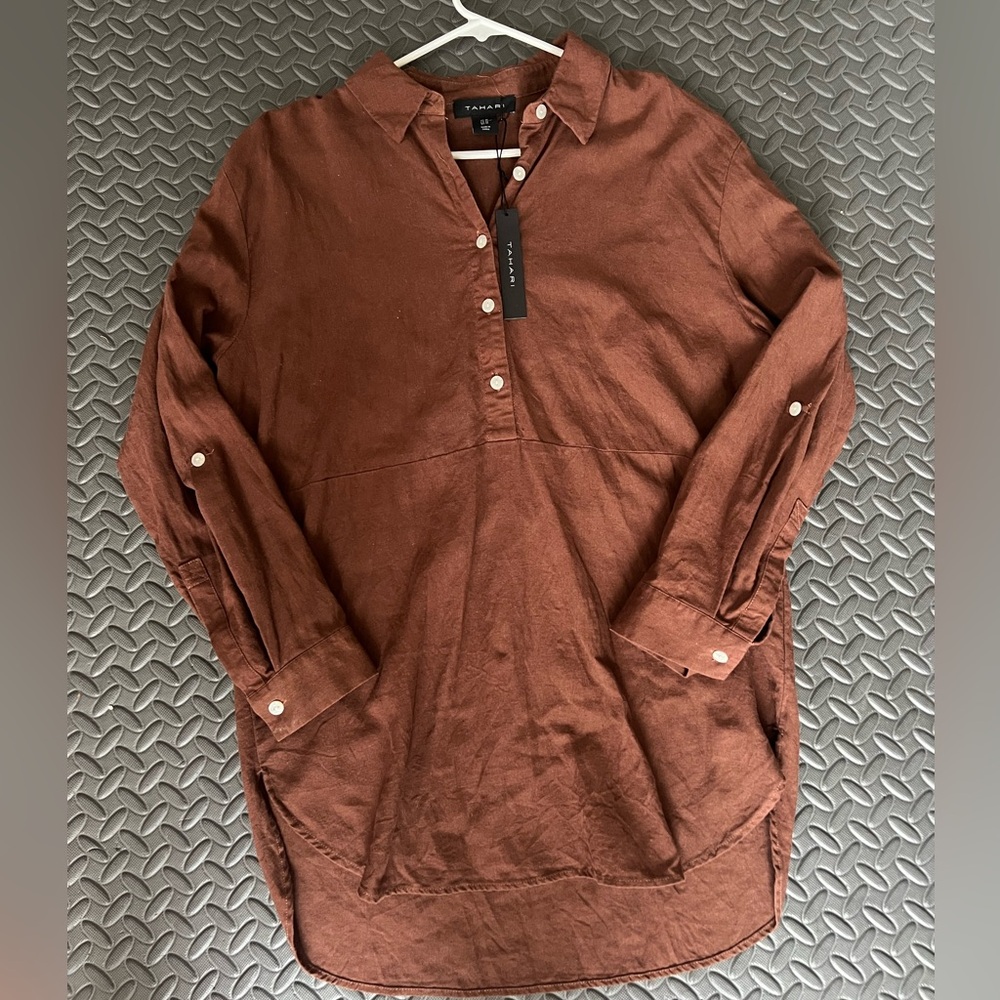 Blouse
Swim suite over up.